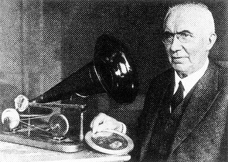 Emil Berliner sits next to his invention, the Gramophone (1888)